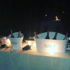 serate tranquille con illuminazione candele alla citronella asticera