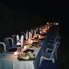 serate tranquille con illuminazione candele alla citronella asticera